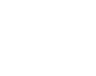A white outline of a heart with a zigzag line running through it, resembling a heartbeat or electrocardiogram (ECG/EKG) symbol, on a transparent background.